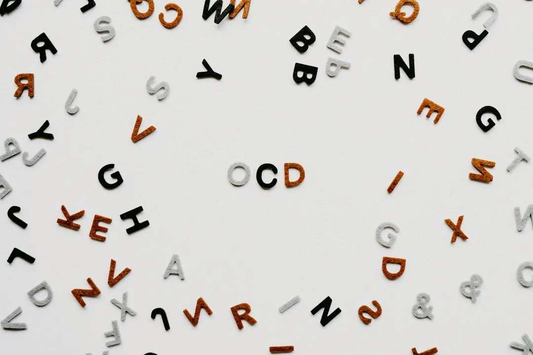 Pile of letters spelling OCD